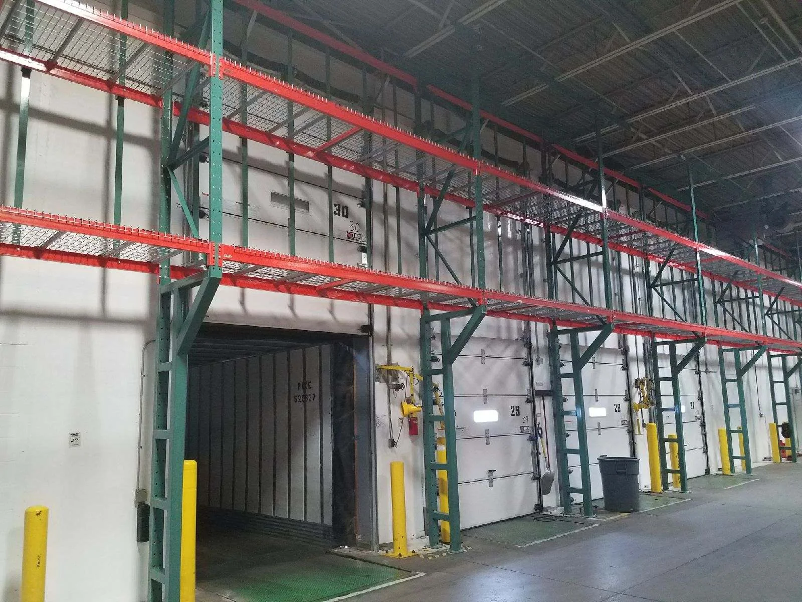 PHI specialist inspecting warehouse pallet racking
