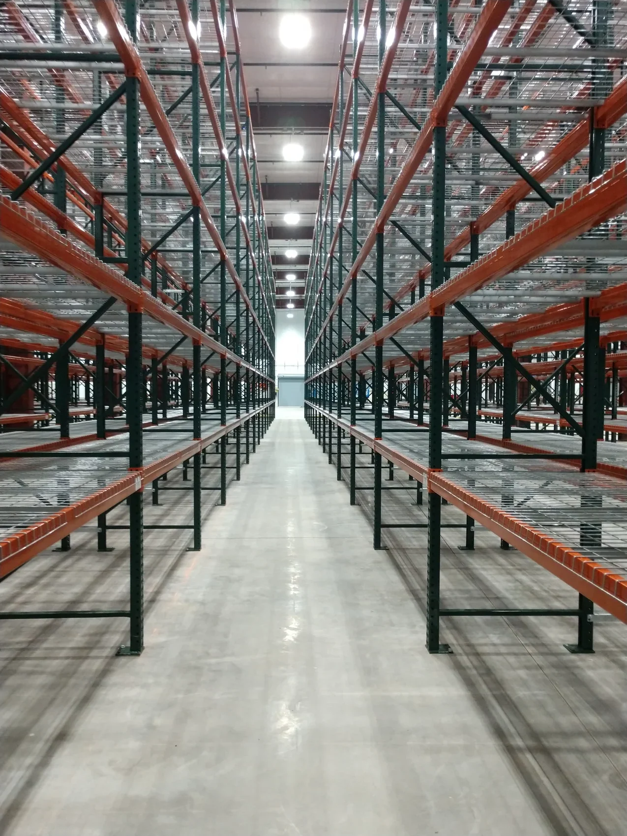 Forklift impact damage to a pallet rack upright